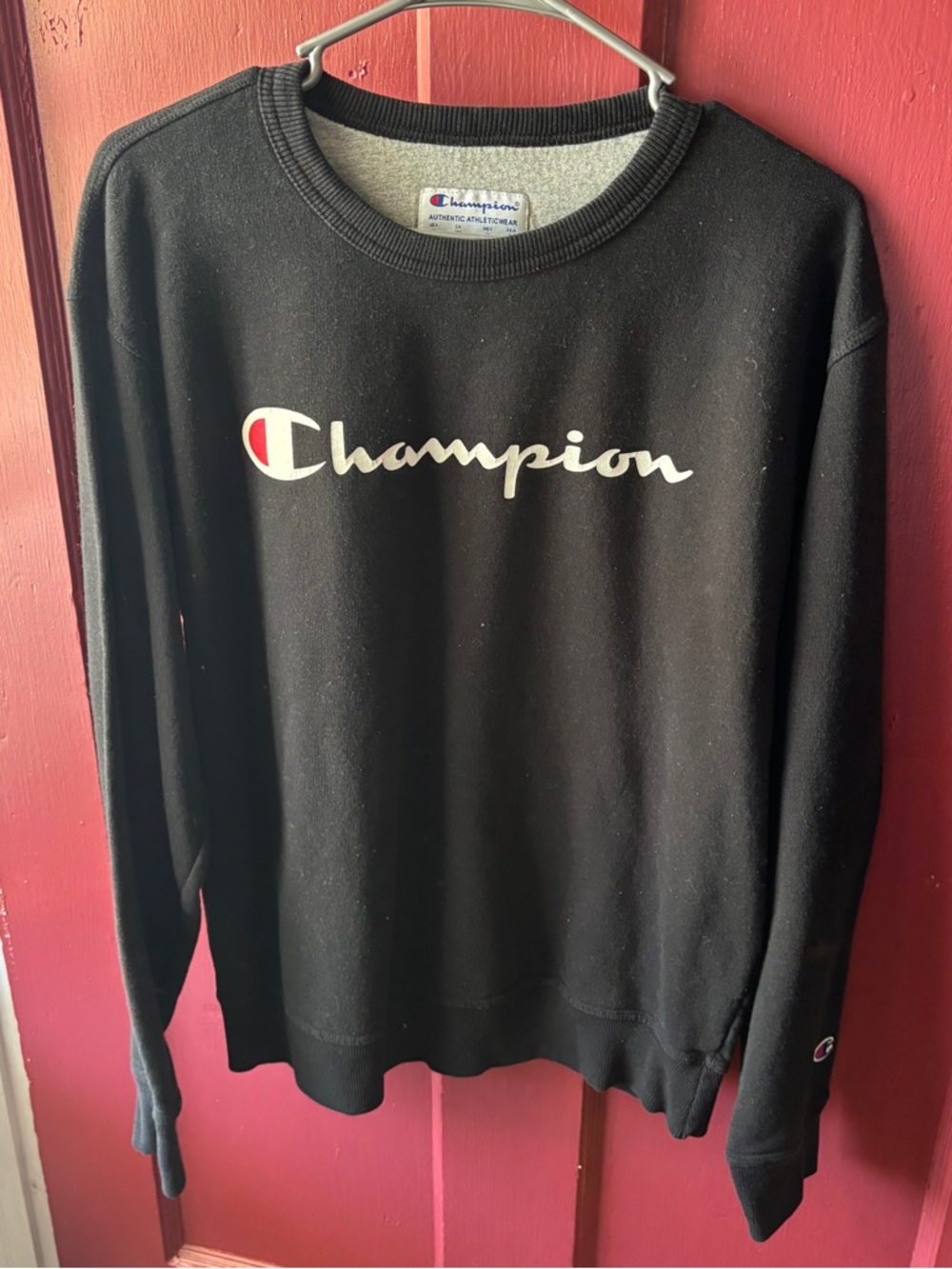 Champion Black Crewneck Sweatshirt with White Script and Red Logo Accent